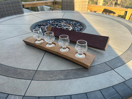 Wine barrel tasting flight with glasses